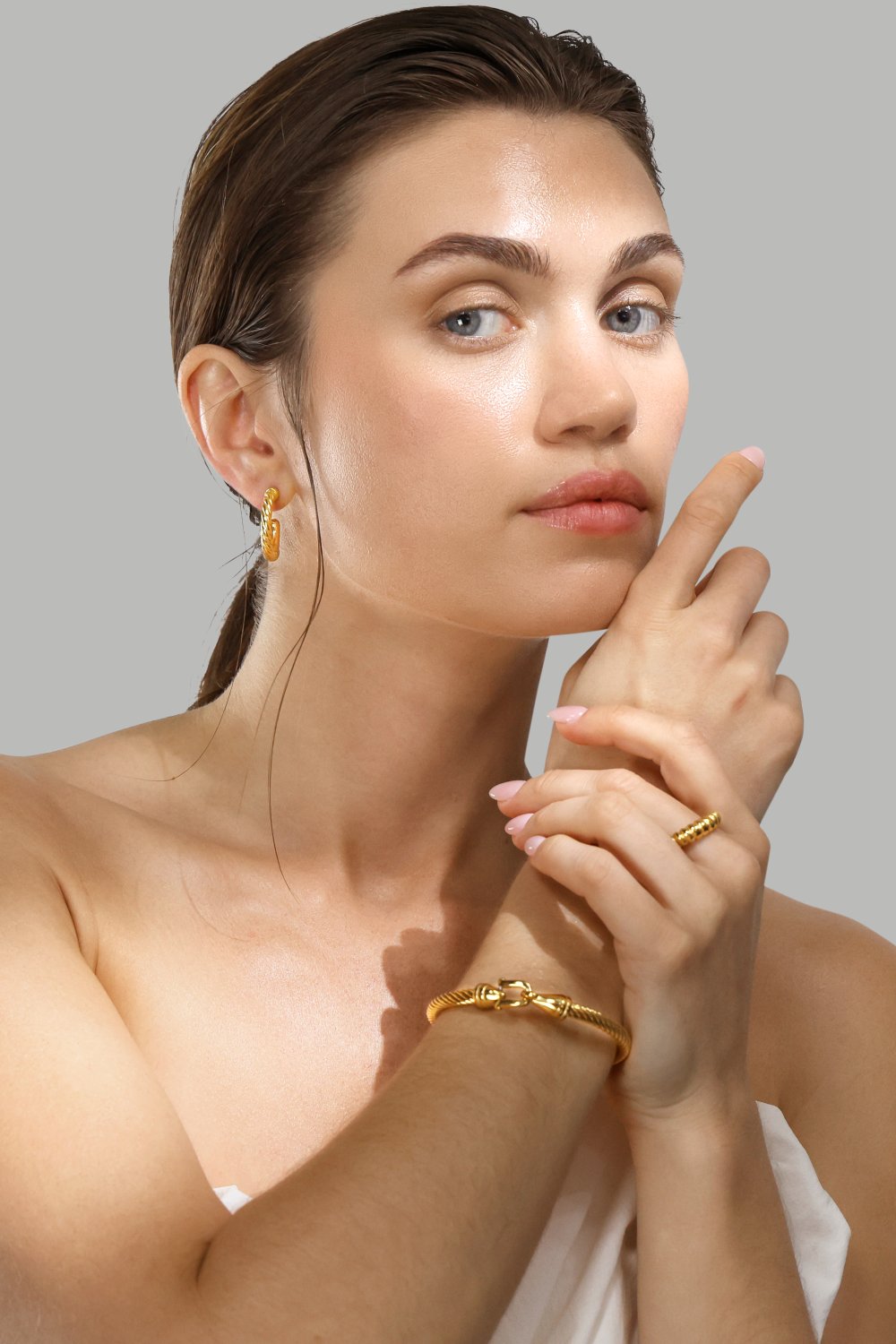 Korvakorut Twistade Hoops – 18k Kullatut