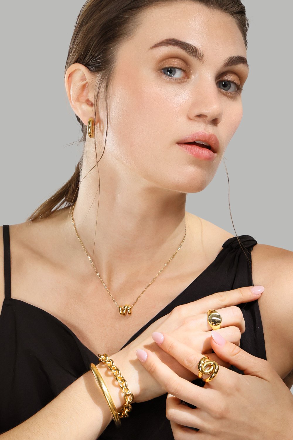 Kaulakoru W-Twist – 18k Kullattu